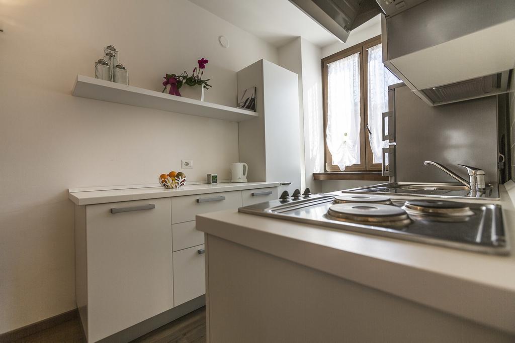 Le Servite Apartments Arco Bilik gambar